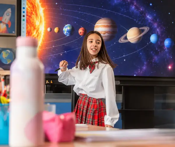Student in a classroom scene with distracting image marks cleared